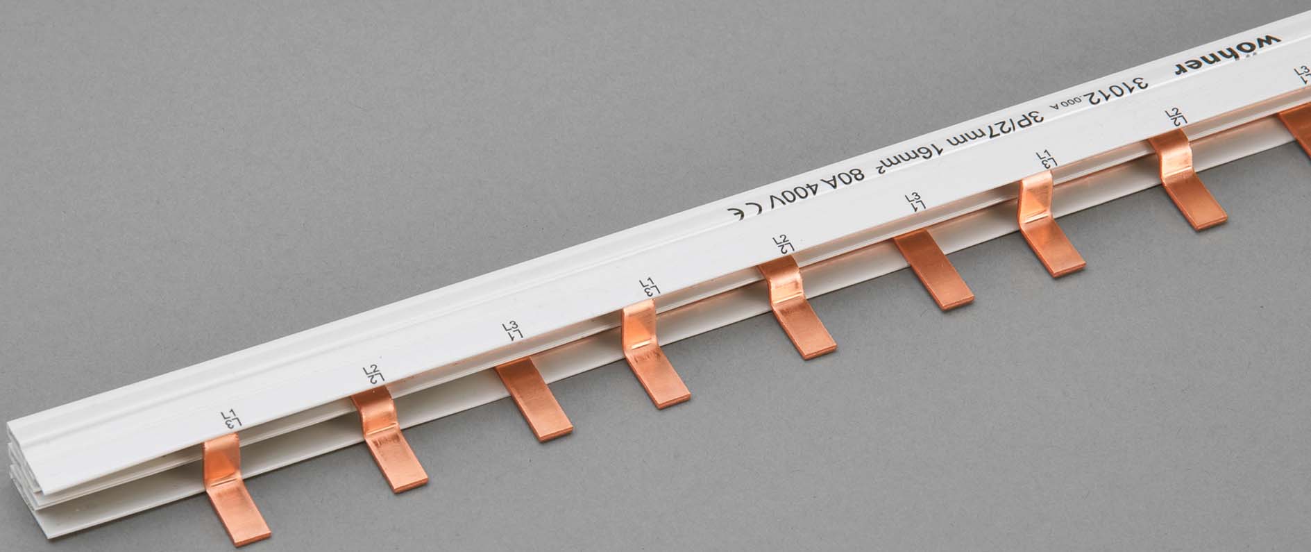 Wöhner Kammschiene 3pol. 400V AC L=1m 31012 Wöhner Kammschiene 3pol. 400V AC L=1m 31012